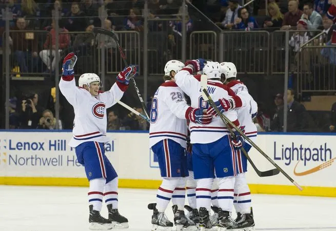 Montreal Canadiens celebrate after scoring a goal during a game between the New York Rangers at Madison Square Garden Manhattan, New York. The Canadiens won against the New York Rangers, 4-1.