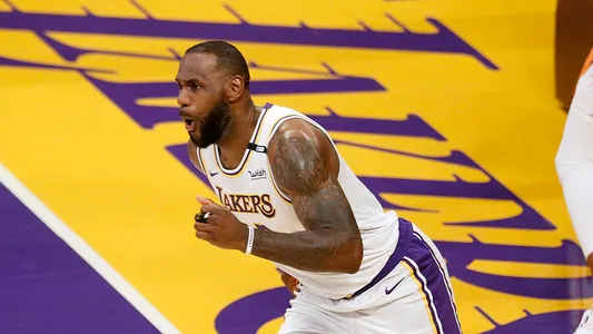 LA Lakers forward LeBron James celebrates after slam dunking the ball in a game against the Phoenix Suns, Sunday, May 30, 2021 in Los Angeles, CA