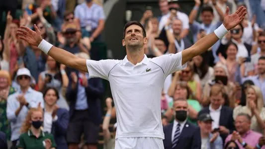 Novak Djokovic celebrates after winning the men's final match against Matteo Berrettini at Wimbledon tennis Championship in London, Britain, on July 11, 2021 | Photo by: Chine Nouvelle