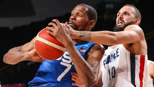 Team France shooting guard Evan Fournier knocks the ball from Team United States forward Kevin Durant in the second half at Saitama Super Arena, Tokyo Olympics, Japan, July 25, 2021